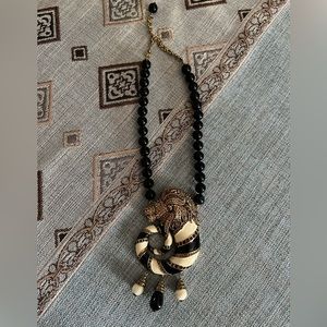 Heidi Daus Lion Necklace—black, off-white/cream, oranges, gold, nearly new